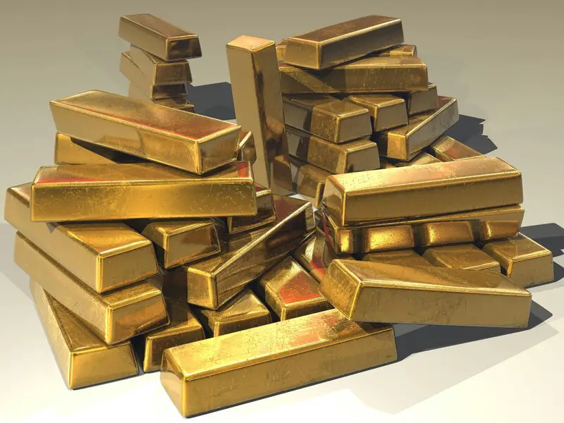 Stack of gold bars representing safe haven investment